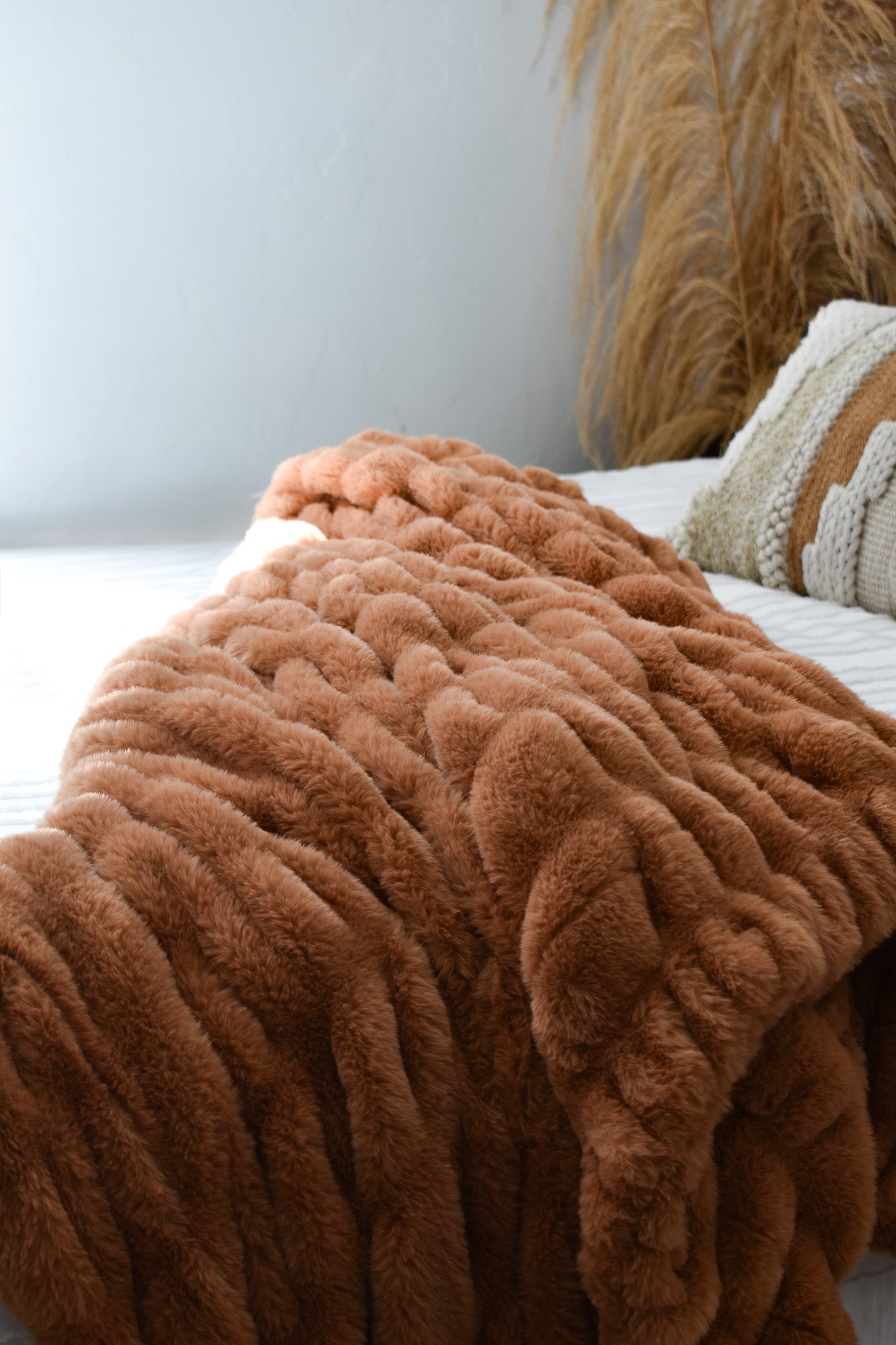 Poppy's Fav faux fur throw blanket on bed — Poppy Blankets